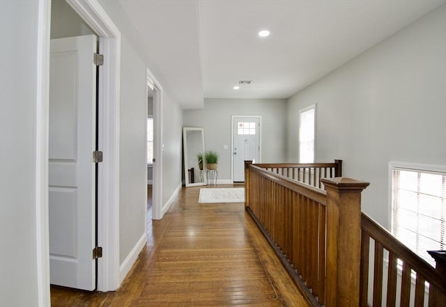 hallway with dark wood-type flooring