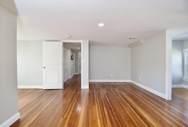 basement featuring wood-type flooring