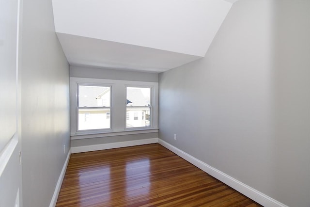 spare room with dark hardwood / wood-style floors