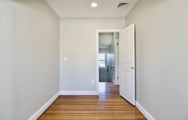 corridor featuring light hardwood / wood-style flooring