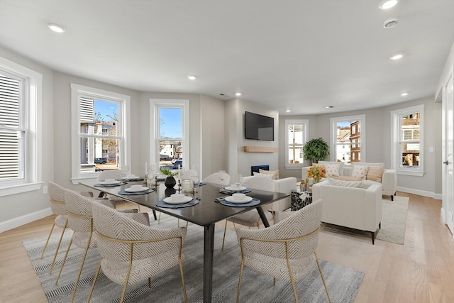 dining space featuring light hardwood / wood-style floors