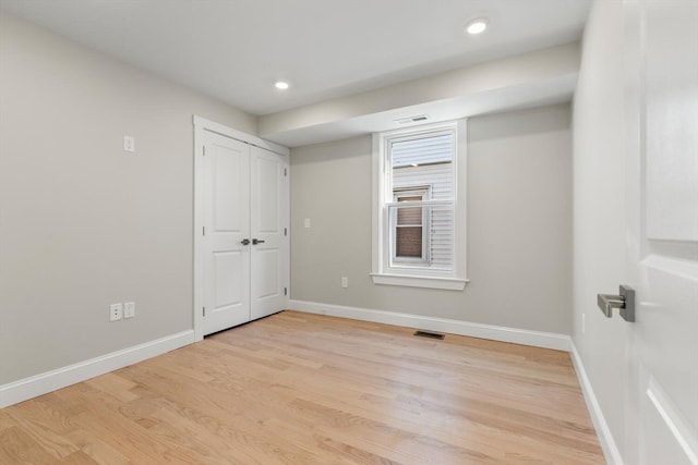 unfurnished room featuring light wood-type flooring