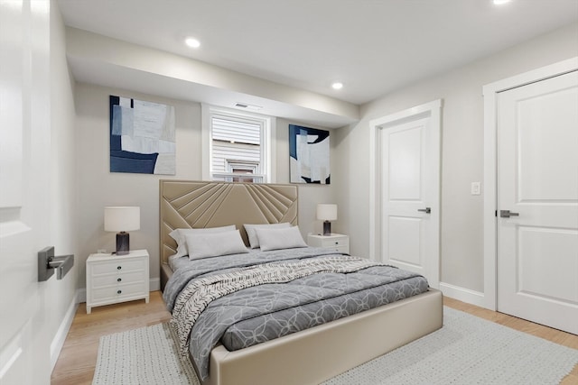 bedroom featuring light hardwood / wood-style floors