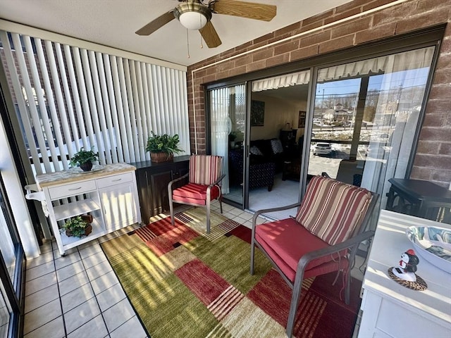 sunroom / solarium with ceiling fan