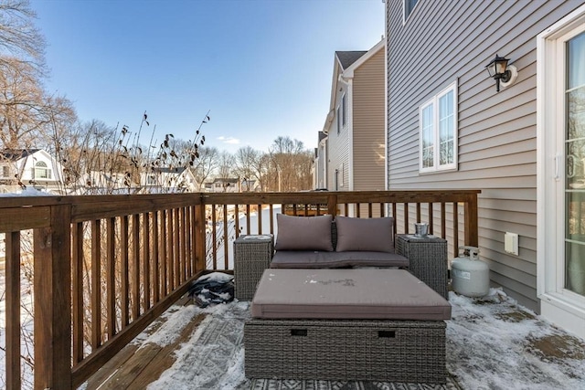 view of snow covered deck