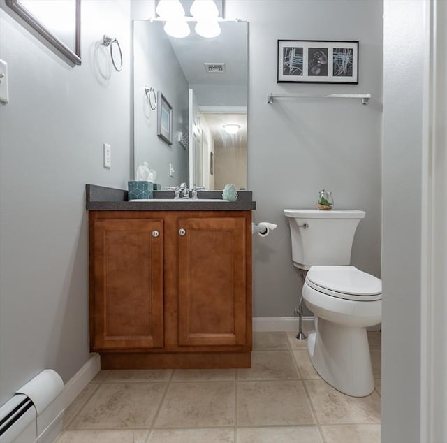 21 Harbor Mist Dr Unit 21, Fairhaven, MA 02719 - bathroom with a baseboard heating unit, vanity, and tile patterned flooring