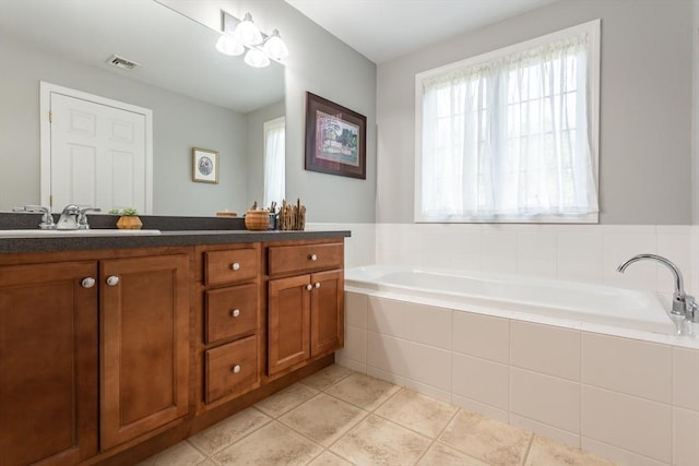 21 Harbor Mist Dr Unit 21, Fairhaven, MA 02719 - full bath featuring plenty of natural light, a garden tub, double vanity, and tile patterned flooring