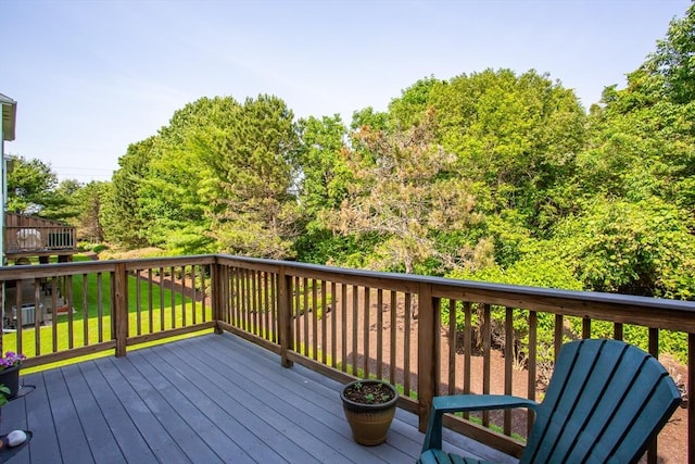 21 Harbor Mist Dr Unit 21, Fairhaven, MA 02719 - wooden deck featuring a lawn
