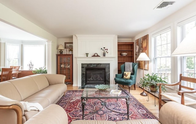 21 Harbor Mist Dr Unit 21, Fairhaven, MA 02719 - living area with light wood finished floors and a fireplace