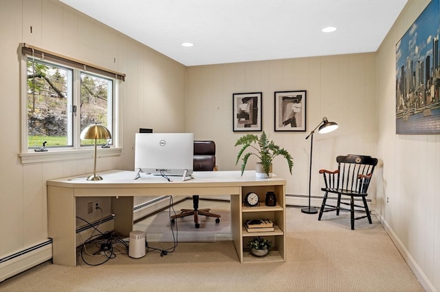 carpeted office space featuring a baseboard radiator and a baseboard heating unit