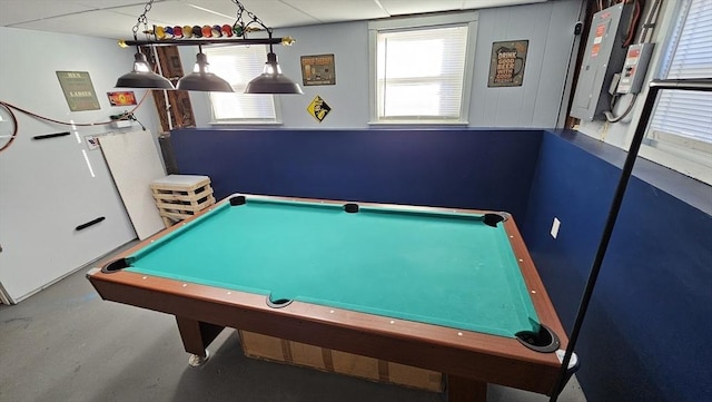 game room featuring a healthy amount of sunlight, concrete floors, and pool table