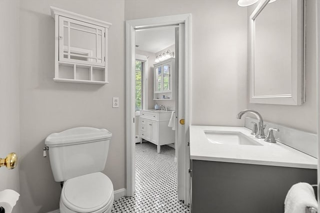 4 Crestwood, Marblehead, MA 01945 - bathroom with vanity, toilet, and baseboards
