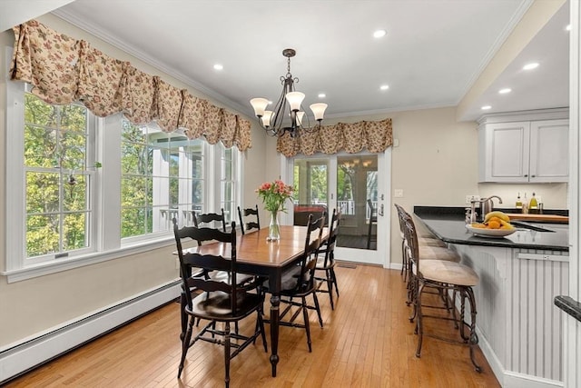 4 Crestwood, Marblehead, MA 01945 - dining room featuring a baseboard heating unit, recessed lighting, ornamental molding, light wood-style floors, and a chandelier