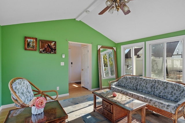 living room with lofted ceiling with beams, wood-type flooring, and ceiling fan