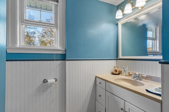 bathroom with vanity and a wealth of natural light