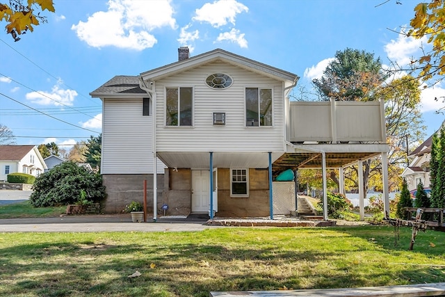 view of front of home with a front yard