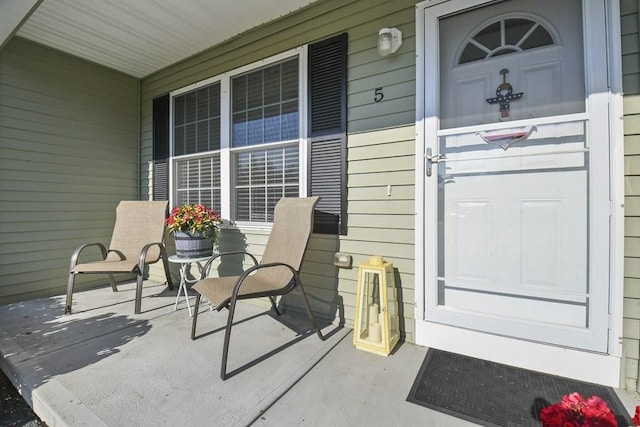 entrance to property with a porch