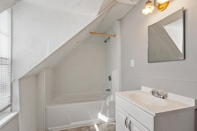 full bath featuring vanity and shower / bathtub combination