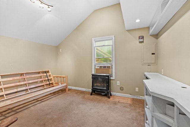 49 Boathouse Rd, Groton, MA 01450 - home office featuring a wood stove, electric panel, light carpet, lofted ceiling, and cooling unit