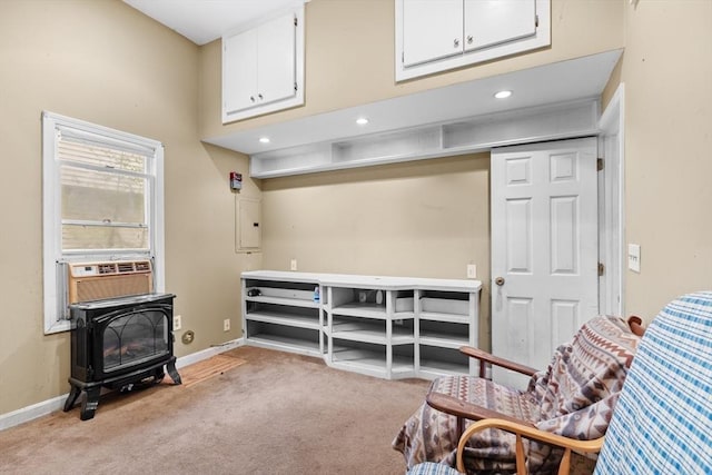 49 Boathouse Rd, Groton, MA 01450 - sitting room featuring light carpet, a wood stove, baseboards, recessed lighting, and cooling unit