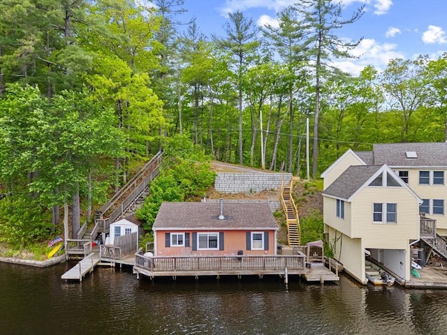 49 Boathouse Rd, Groton, MA 01450 - back of property featuring stairs and a deck with water view