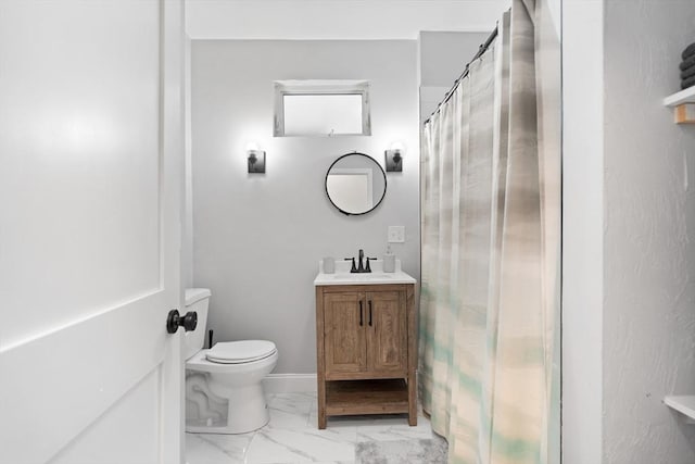 full bath featuring toilet, marble look tile flooring, vanity, and curtained shower
