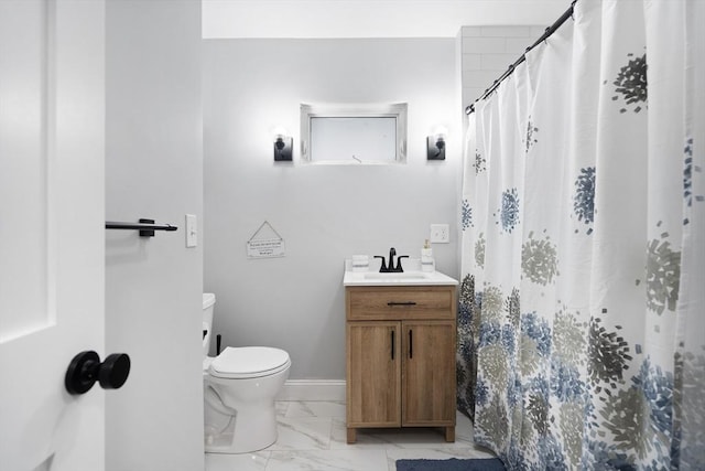 bathroom featuring marble look tiles, toilet, vanity, curtained shower, and baseboards