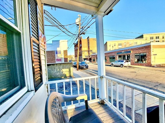 balcony featuring a porch