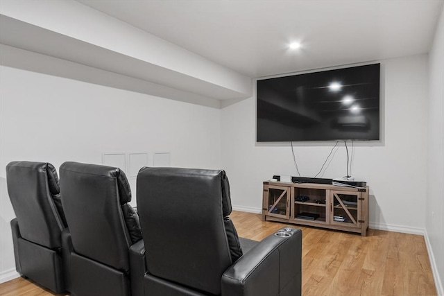 home theater featuring light hardwood / wood-style floors