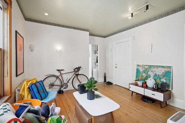 46 Hunting St, Somerville, MA 02143 - living room featuring hardwood / wood-style flooring, baseboards, recessed lighting, and rail lighting