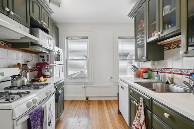 46 Hunting St, Somerville, MA 02143 - kitchen featuring white appliances, light countertops, and healthy amount of natural light