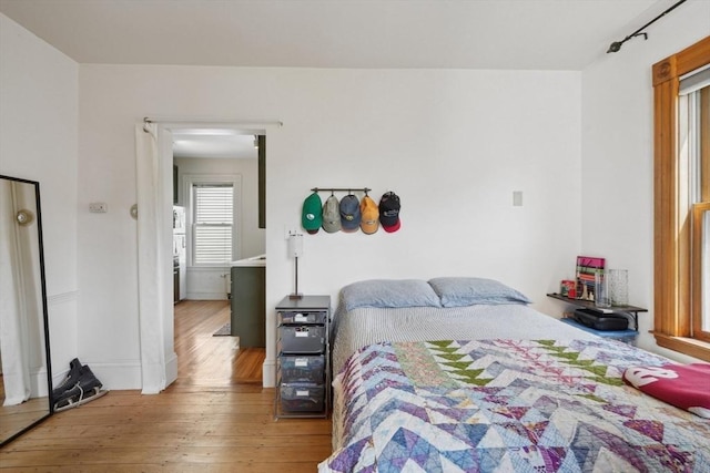 46 Hunting St, Somerville, MA 02143 - bedroom featuring light wood-type flooring and baseboards