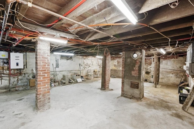46 Hunting St, Somerville, MA 02143 - unfinished below grade area with tankless water heater