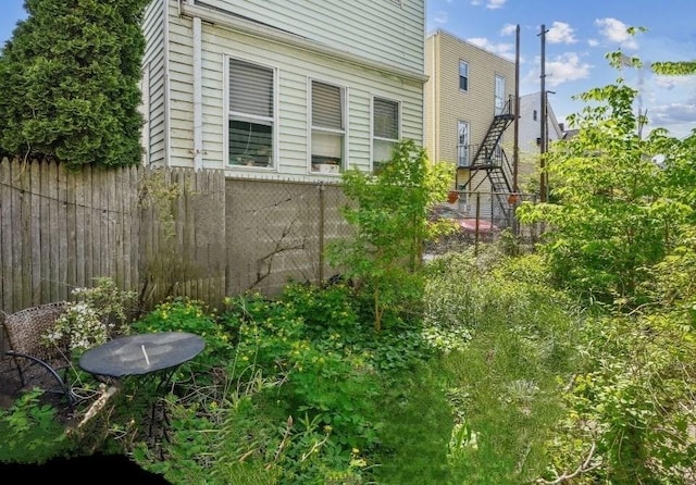 46 Hunting St, Somerville, MA 02143 - view of home's exterior featuring fence