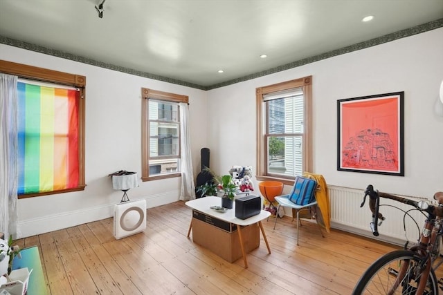 46 Hunting St, Somerville, MA 02143 - sitting room with light wood-type flooring, baseboards, and ornamental molding