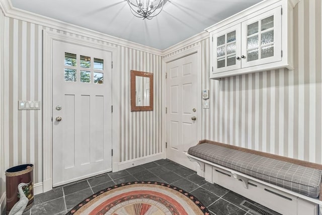 21 Fernway, Winchester, MA 01890 - entrance foyer featuring wallpapered walls, baseboards, a chandelier, and ornamental molding