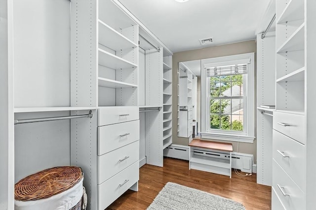 21 Fernway, Winchester, MA 01890 - walk in closet featuring wood finished floors and baseboard heating