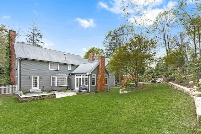 21 Fernway, Winchester, MA 01890 - rear view of house with a patio, a chimney, and entry steps