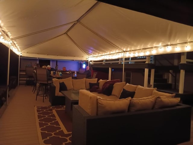 home theater room with vaulted ceiling