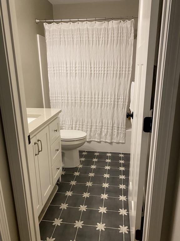 30 Old Washington St Unit 2, Pembroke, MA 02359 - full bath with vanity, toilet, shower / bath combo with shower curtain, and tile patterned floors