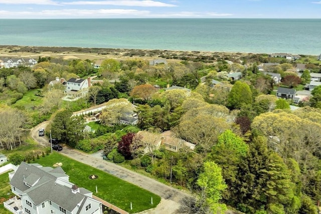 aerial overview of property's location featuring a nearby body of water and nearby suburban area