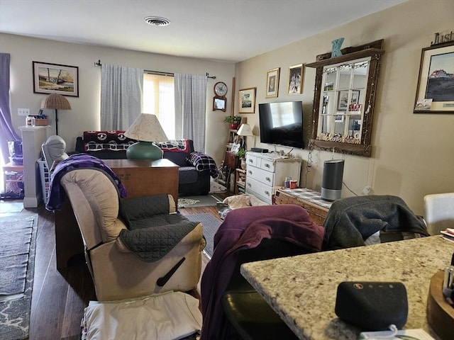 26 Harvard Unit C, Ayer, MA 01432 - living room featuring visible vents and wood finished floors