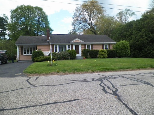 7 Maple Ln, Millbury, MA 01527 - ranch-style house featuring a chimney, driveway, and a front yard