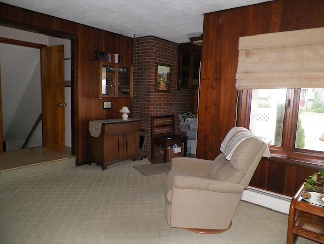 7 Maple Ln, Millbury, MA 01527 - living room with light colored carpet and wood walls