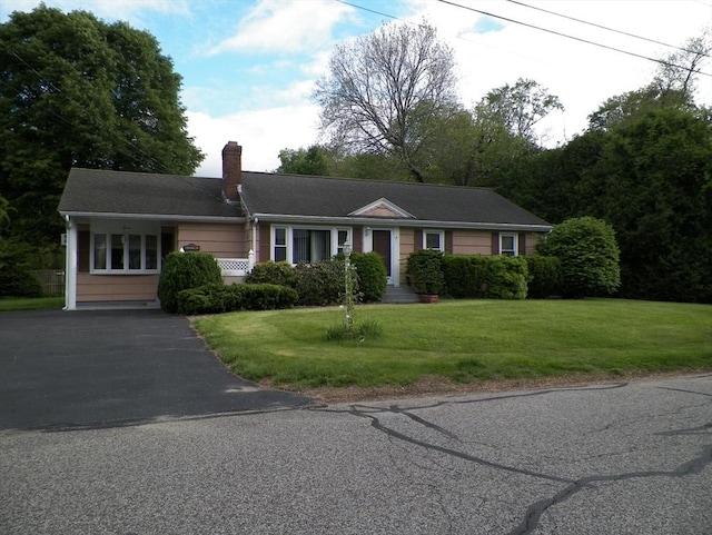 7 Maple Ln, Millbury, MA 01527 - ranch-style house featuring a chimney, a front lawn, and asphalt driveway