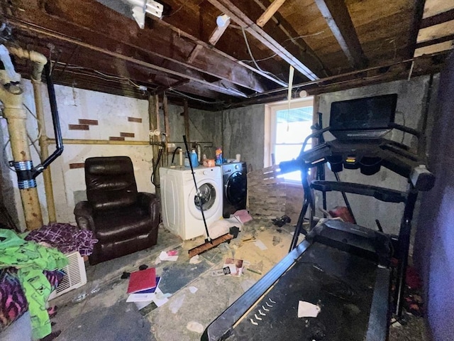 basement featuring washing machine and dryer