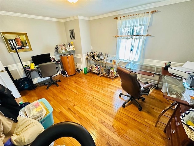 office space featuring hardwood / wood-style floors and ornamental molding