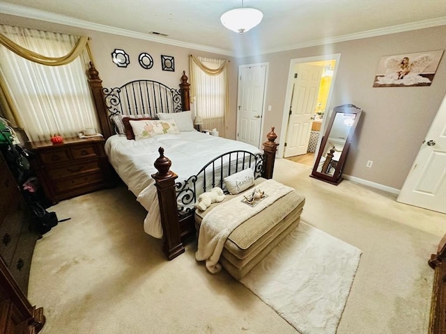 carpeted bedroom with crown molding