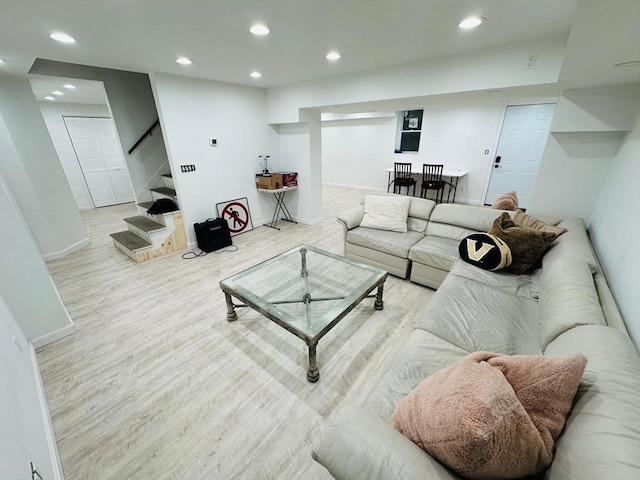 living room with light hardwood / wood-style flooring