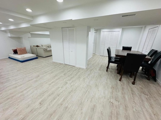 dining area with light hardwood / wood-style flooring